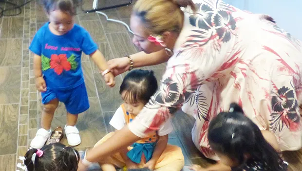 DOH Helping Hands Madelyn Aiava Aiono with children