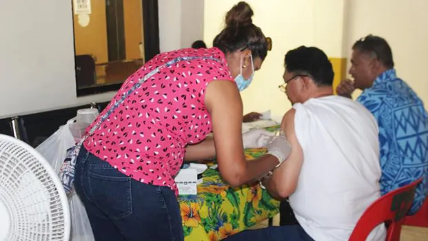 Man being inoculated with the MMR vaccine
