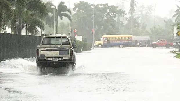 A flooded road in Samoa's Pesega