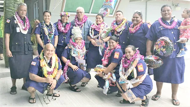 The 11 graduates and EMS head Popo Avegalio