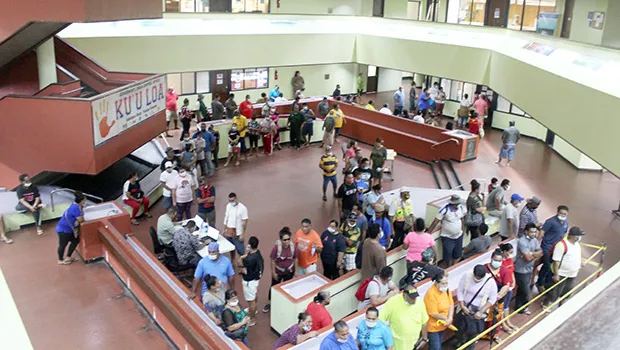 A view of the atrium at the EOB crowded with people