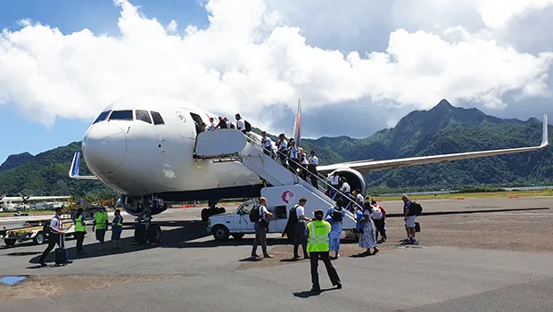 Some of the 29 missionaries boarding the charter flight