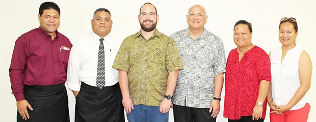 DOH officials, including Dr. Glenn Gabbard (center in green)