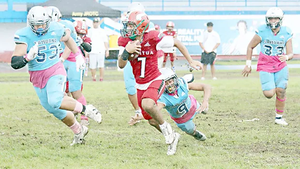 The Vikings quarterback scrambling out of the pocket