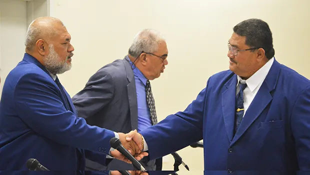 Fetu Fetui Jr shaking hands with Rep. Sataua Dr. Mataese Samuelu 