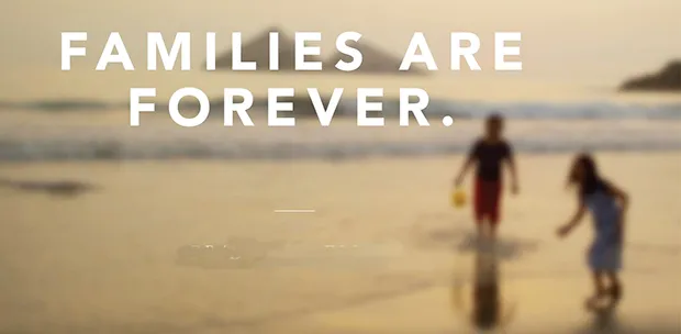 Families are forever graphic with children playing in the surf