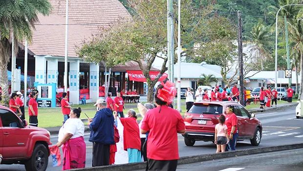 FAST supporters wave