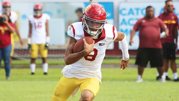 Tafuna Warriors quarterback Oakland Salave’a scrambling
