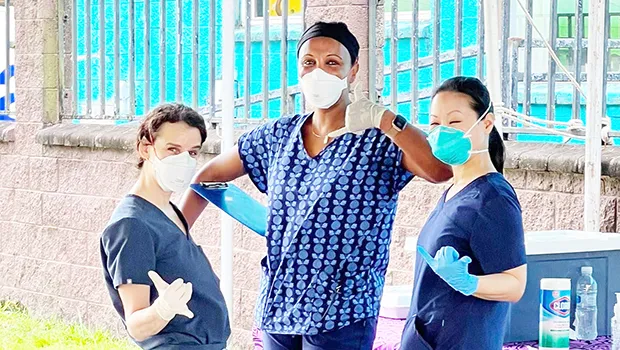 Three healthworkers posing