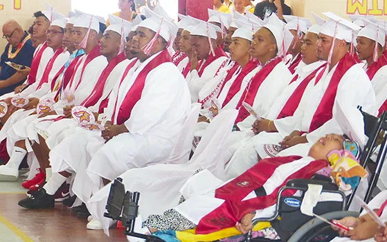 Several male graduates of Faga'itua HS Class of 2019