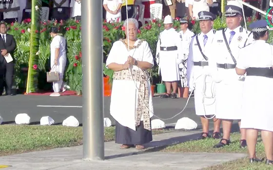Fiame raising samoa flag
