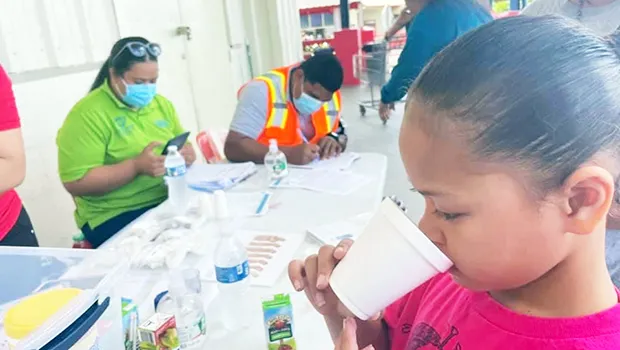 Little girl taking Lymphatic Filiariasis pills 