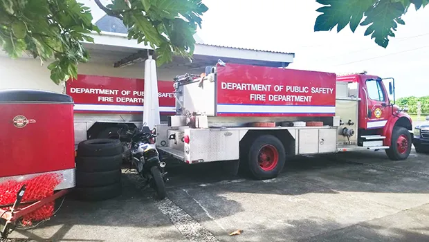 Two firetrucks awaiting parts