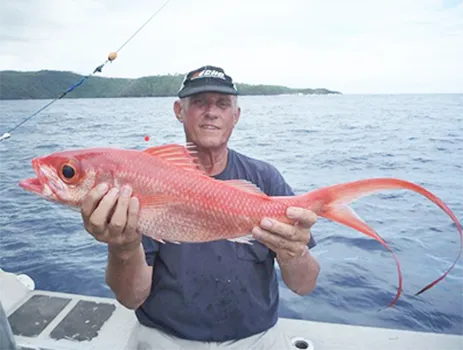 Man with bottom fish