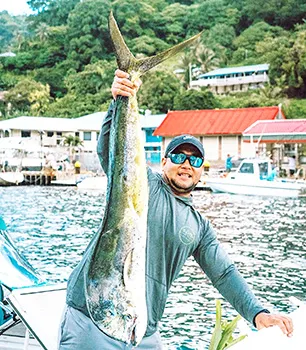 Man holding up a masi masi 