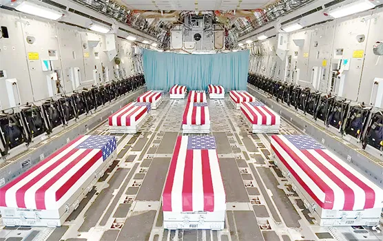 Flag-draped caskets