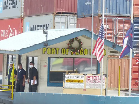 Flags lowered at entrance to port