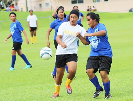 Jordynn Liu-Kuey of Fa’asao-Marist (left) in action against a Samoana defender during