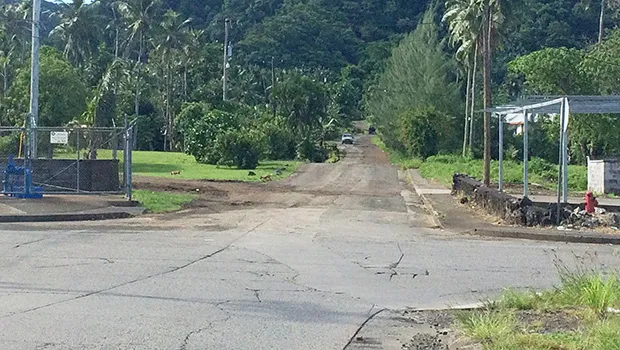 the four-corner intersection: the road from Fagaima heading into Kokoland area, as well as into Ottoville; and the unpaved road (up ahead), passing through the Fonoti family property, and further up to the Leapaga family land on to the main road in Malaeimi. 