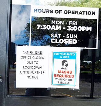 Sign of closed on front of ASNAP office