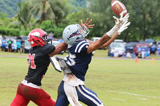 Allen Seagai focuses on hauling in this catch