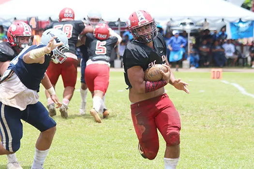 Mika Tavai (54) of the Vikings taking this reverse hand off play