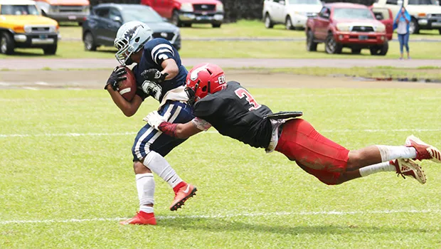 Kobe Lefiti crossing the goal line