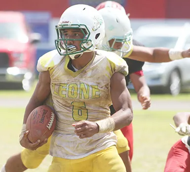 Joshua Taani of the Lions returning a kick off to midfield during