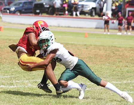 John Allen of Tafuna HS holding the ball