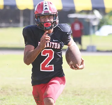 Faga’itua Vikings Fitu Amata breaking loose to open field