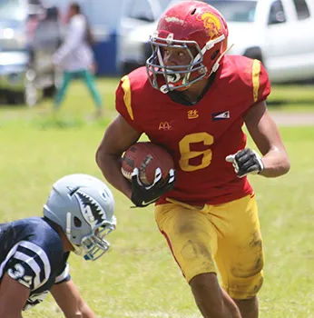 Isaiah Gurr of the Warriors with the ball at the sidelines
