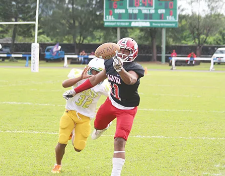 Manuita Sofeni (11) of the Vikings attempting to catch a long pass by