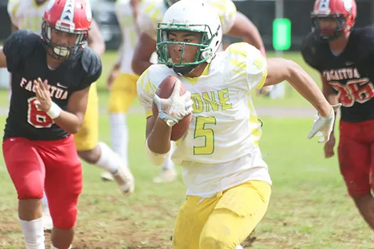 Freshman running back for the Leone Lions, Wylan Faga (5) breaking