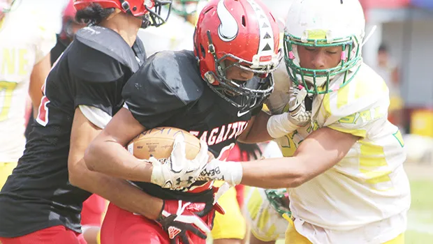 Faga’itua Vikings’ Scott Pese is stopped 