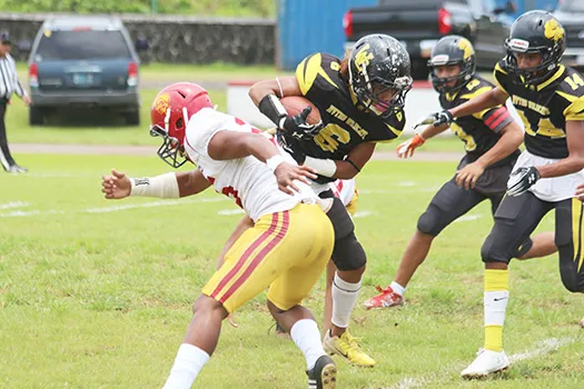 Justin Isileli (6) of the Nu’uuli Wildcats returning the opening kick-off