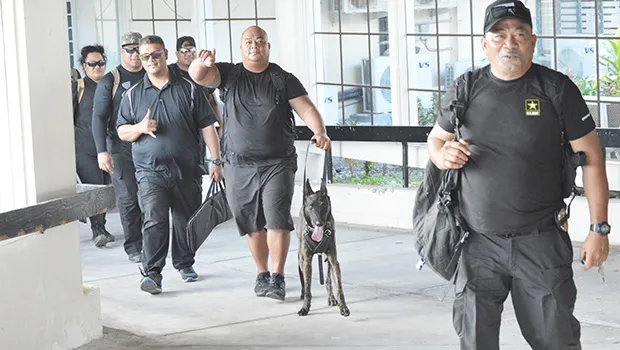detectives of the DPS Vice & Narcotics / K-9 Units at the Pago Pago International Airport 