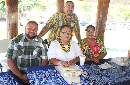Taupau Tauleave Toluono (standing) along with ASG personnel