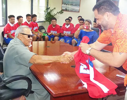 American Samoa Baseball Association president, Marcus Langkilde presented Gov. Lolo Matalasi Moliga with team jersey.