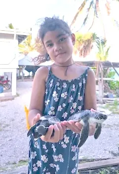 Ilissapesi Sakalia holding her turtles 