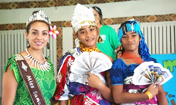 GLOW girls wearing their recycled outfits with 2018 Miss Samoa