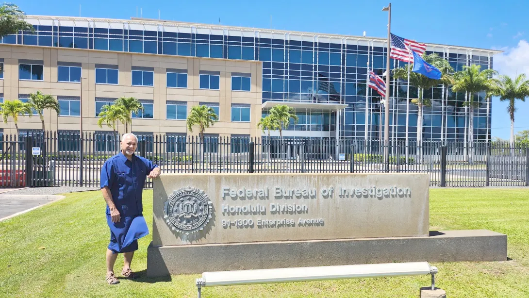 Governor Pulaali’i in front of fbi office in Honolulu