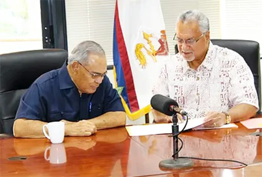 OIA Director Nikolao Pula with Governor Lolo Moliga