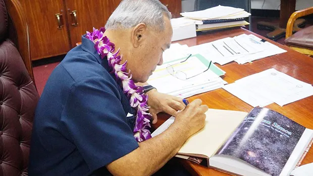 Governor signs new edition of Centennial Book 