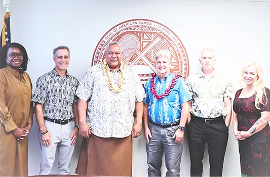 Gov. Lemanu with UH President Lassner and others