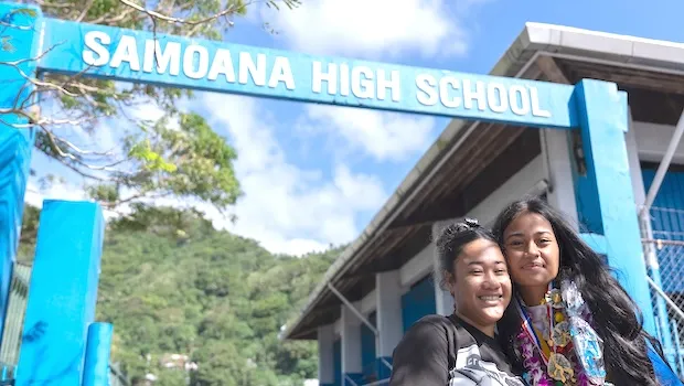 Two Samoan HS graduates