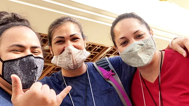 Three healthworkers from Honolulu posing