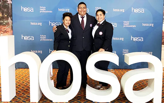  (l-r) students Chole Tuaua and Darius Shimasaki-Vaofanua and ASCC HOSA Coordinator Monica Afalava.