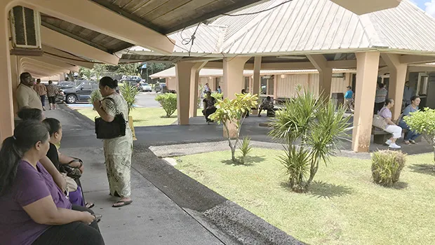 People sitting outside at LBJ hospital during power outage