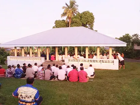 Members of the village of Falefa present a traditional Samoan ifoga 