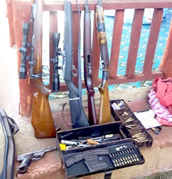 uns and bullets taken from a Police raid 